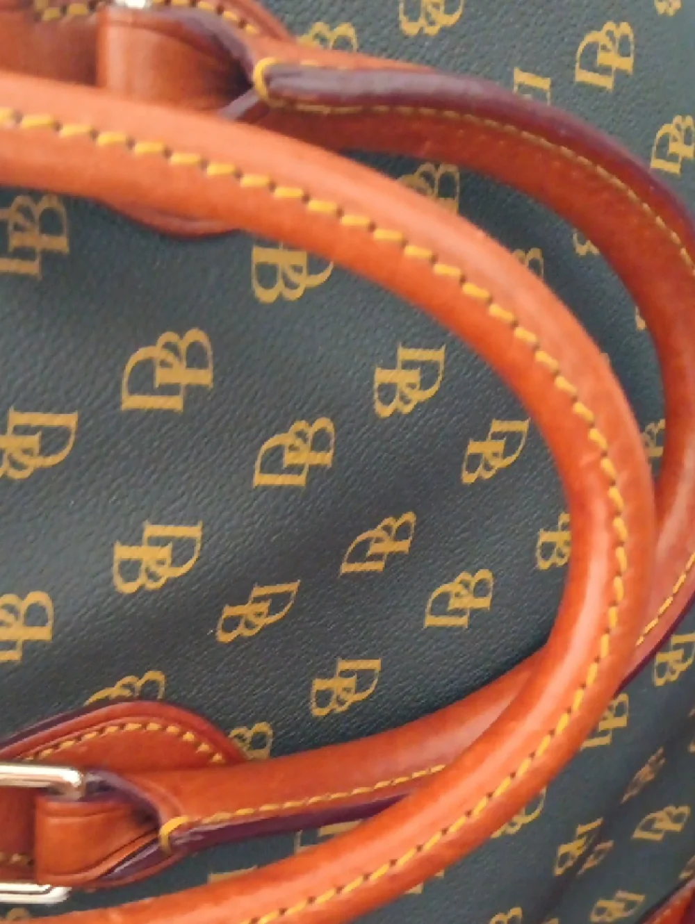 Dooney & Bourke Brown Monogram Handbag with Tan Leather Accents
